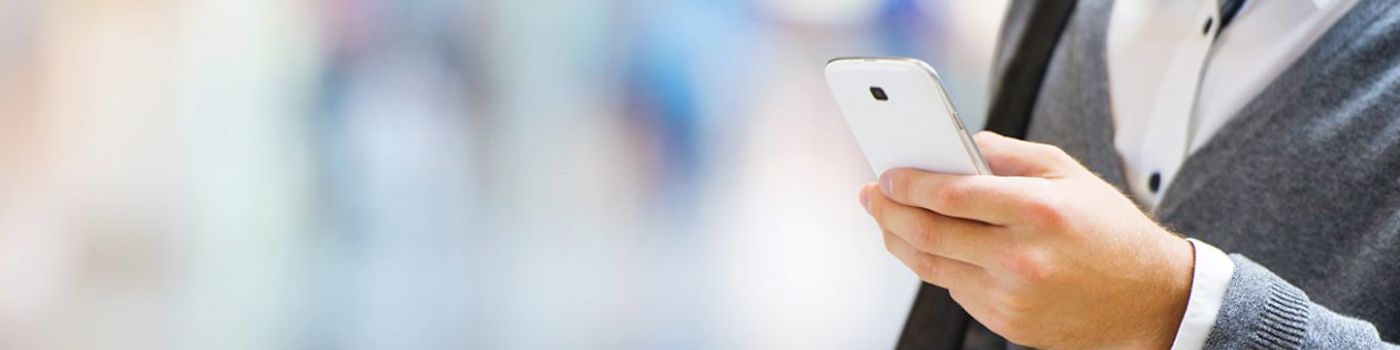 man holding a mobile phone